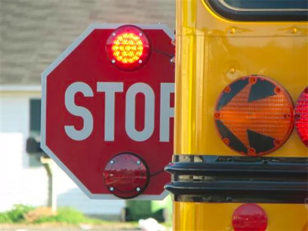 Failing to stop for a school bus has the risk of getting a traffic ticket, fine, and 4 demerit points on your license.